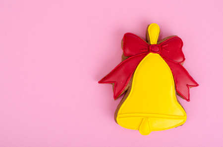 Homemade gingerbread with icing in shape of bells. Studio Photo