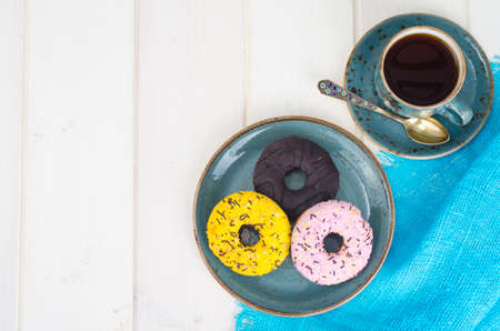 Fresh donuts, hot tea for lunch.の写真素材