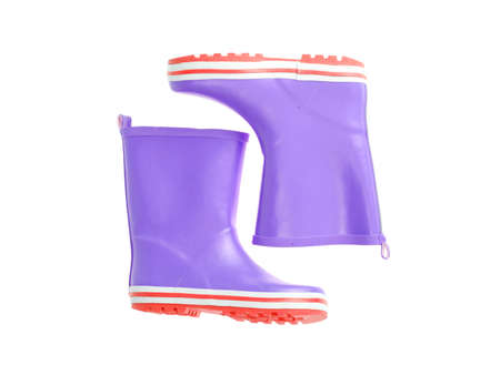 Childrens pink rubber boots for walking.