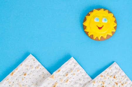 Matzah for passover on blue background.
