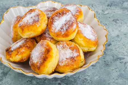 Sweet delicious curd buns. Studio Photo