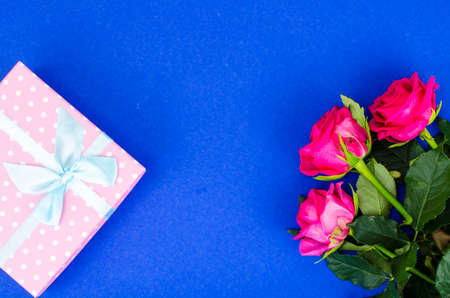 Beautiful bouquet of roses and gift box for holiday. Studio Photoの写真素材