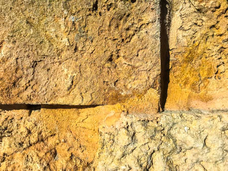 Texture, background, wall of large natural, untreated stones
