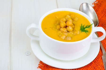 Vegetarian dishes. Pumpkin cream soup with chickpeasの写真素材