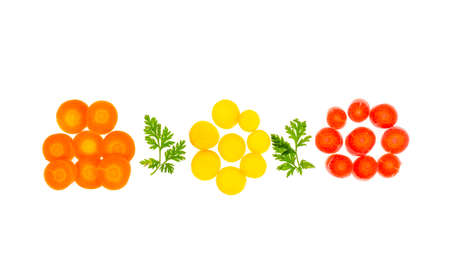 Pieces of colorful raw carrots on white background. Studio Photo