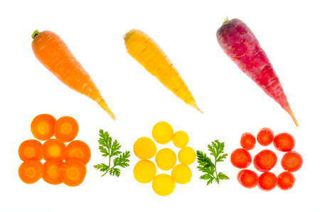 Pieces of colorful raw carrots on white background. Studio Photoの写真素材
