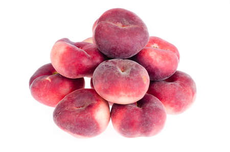 Heap of sweet paraguaya peaches isolated on white background. Studio Photoの写真素材