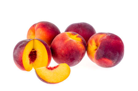 Several ripe sweet peaches isolated on white background. Studio Photoの写真素材