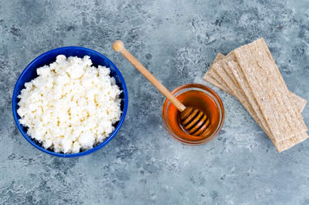 Diet food, cottage cheese and rye bread. Studio Photoの写真素材