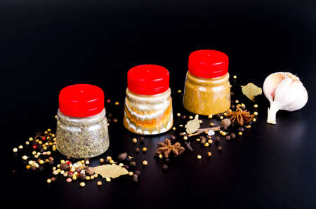Jars with ground dried spices, herb. Studio Photoの写真素材