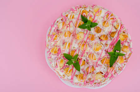 Homemade cream cake decorated with eclairs. Studio Photoの写真素材