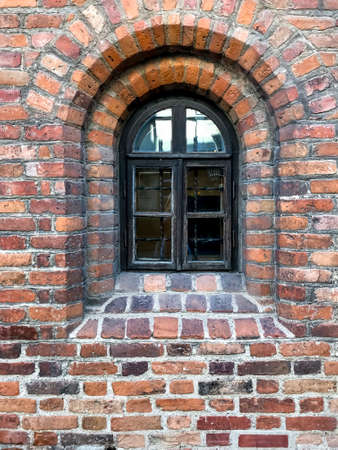Fragment of an old brick wall. Background, brick texture. Studio Photo