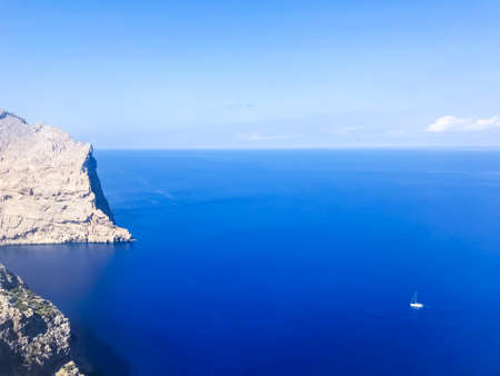 Sea, blue sky, white clouds on sunny day