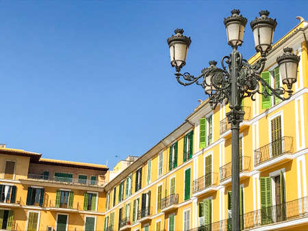 Narrow streets of city Palma, walking tourists.の写真素材
