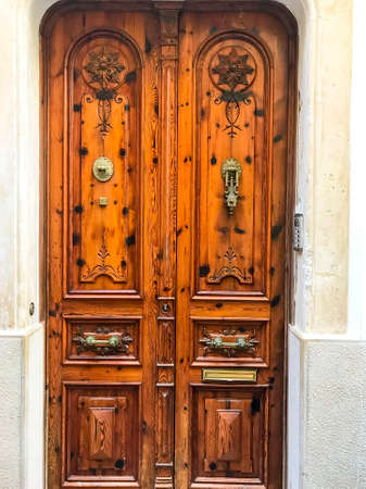 Antique vintage door with metal handle. の写真素材