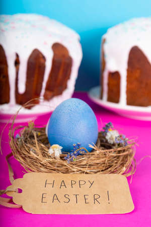 Colorful background with Easter eggs on pink background. Happy Easter concept. Can be used as...