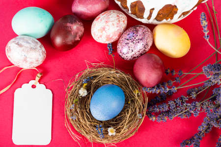 Colorful background with Easter eggs on red background. Happy Easter concept. Can be used as poster,...