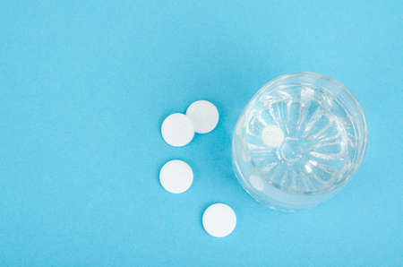 White round tablets, soluble in glass of water.の写真素材