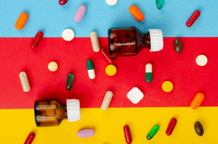 Disease and treatment. Medicine concept. Medication and packaging on bright background.の写真素材
