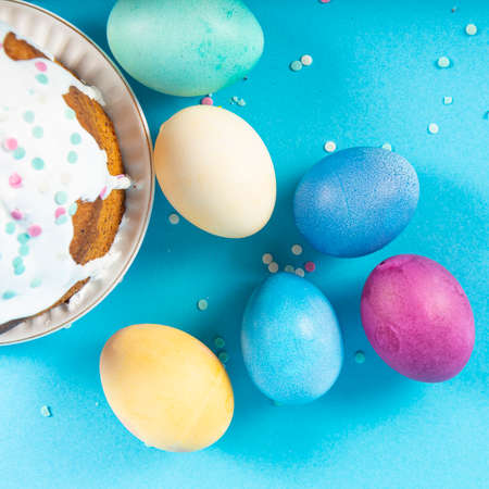 Colorful background with Easter eggs on blue background. Happy Easter concept. Can be used as...