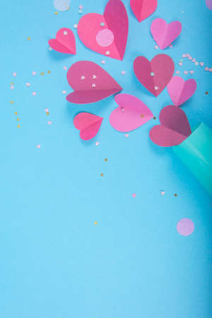 Abstract Background with Paper Hearts, blue champagne glass for Valentine`s Day. Blue Love and Feeling Background for poster, banner, post, card. Top viewの写真素材