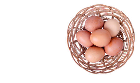 Freshly colored chicken eggs with brown shell. Photo