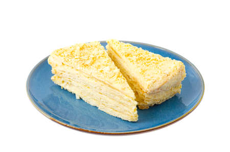 Plate with slice of homemade puff pastry with cream. Photoの写真素材