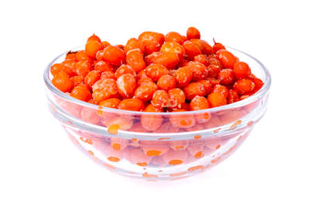Sea buckthorn berries ripe orange frozen on white background.