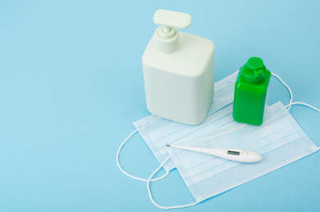 Coronavirus prevention medical masks, sanitizer gel, liquid soap for hand hygiene corona virus...