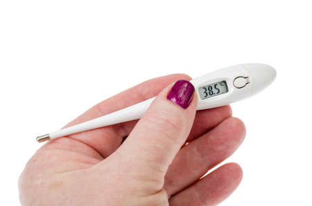 Female hand with electronic thermometer isolated on white background. Studio Photo
