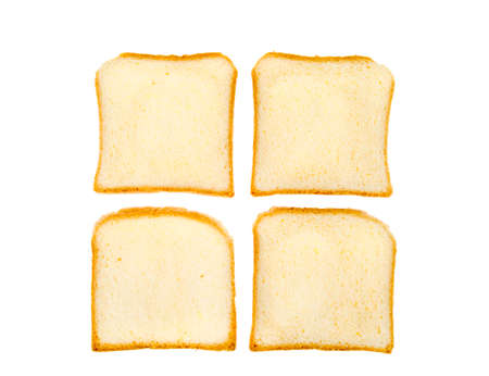 Pieces of square toast wheat bread isolated on white background. Studio Photoの写真素材
