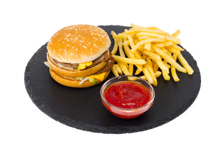 Hamburger and french fries, ketup on black plate. Studio Photoの写真素材