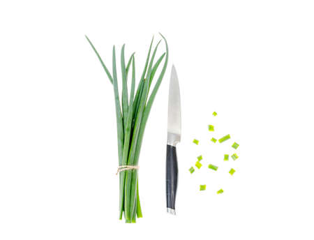 Bunch of fresh chives isolated on white background. Studio Photo