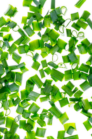 Pile of slices of fresh chives isolated on white background. Studio Photoの写真素材