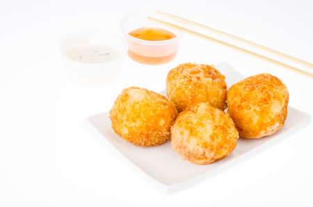 Cheese balls with chicken and mozzarella in batter and breadcrumbs. Studio Photo