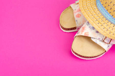 Summer composition of hats and shoes on bright background. Studio Photoの写真素材