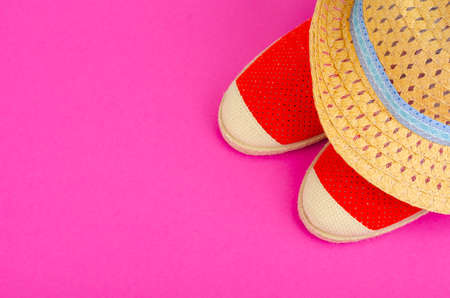 Summer composition of hats and shoes on bright background. Studio Photoの写真素材