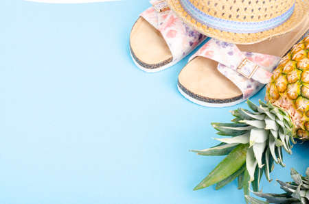 Summer concept, composition with pineapple on bright background. Studio Photo