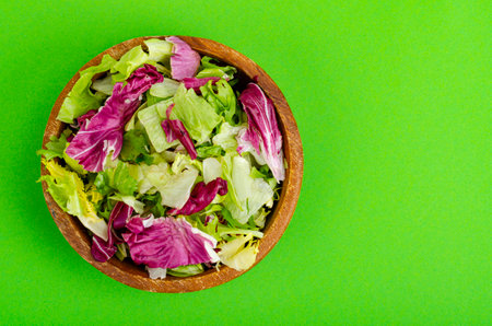 Light dietary vegetarian salad in plate on bright background. Healthy lifestyle concept. Studio Photoの写真素材