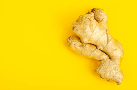 Whole unpeeled ginger root, top view. Studio Photo