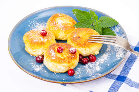 Sweet cottage cheese pancakes on plate, dairy products. Studio Photoの写真素材