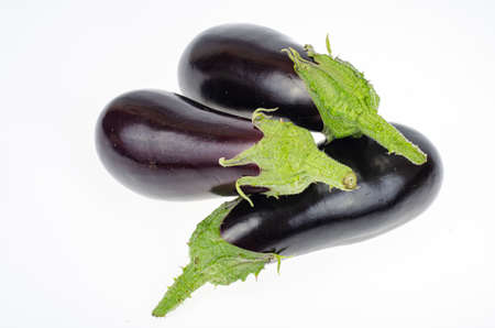 Ripe eggplant on white background. Studio Photo.