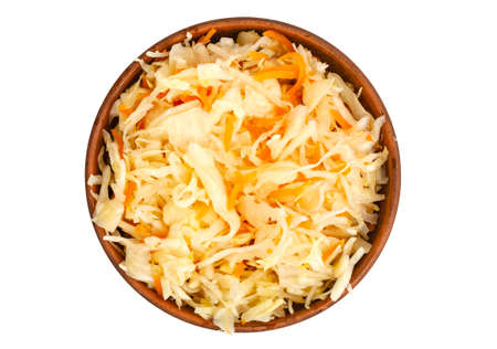 Brown clay bowl with sauerkraut, isolated on white background. Studio Photoの写真素材