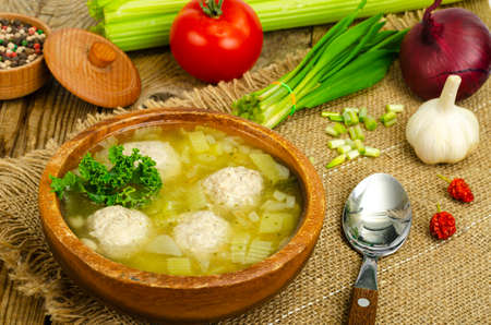 Vegetable soup with meatballs, vegetables on background. Studio Photoの写真素材