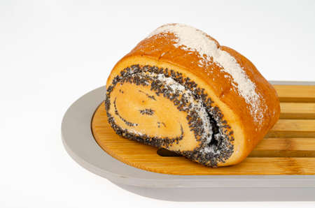 Fresh delicious homemade pastries, poppy seed bun. Studio Photo.の写真素材