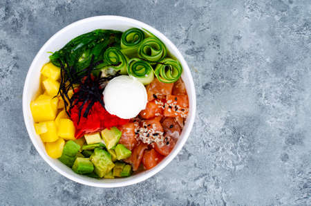 Poke with vegetables and fresh salmon. photoの写真素材