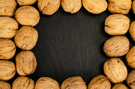 Ripe walnuts on black background. Studio Photo.の写真素材