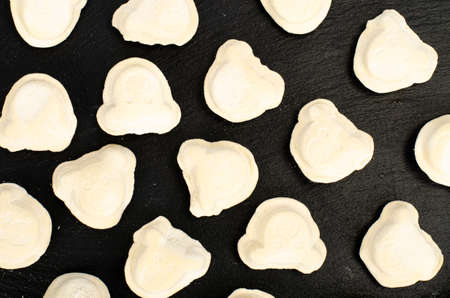Raw dumplings with organic meat for baby food. photo
