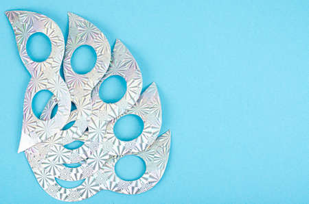 Color mardi gras beads, masks on bright background. photoの写真素材