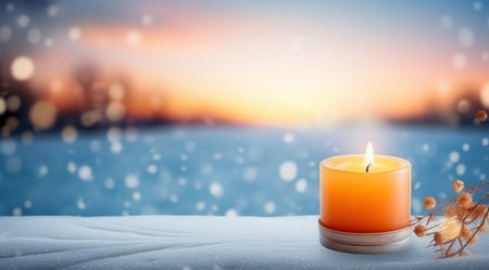 christmas background winter candle in snow background,の素材